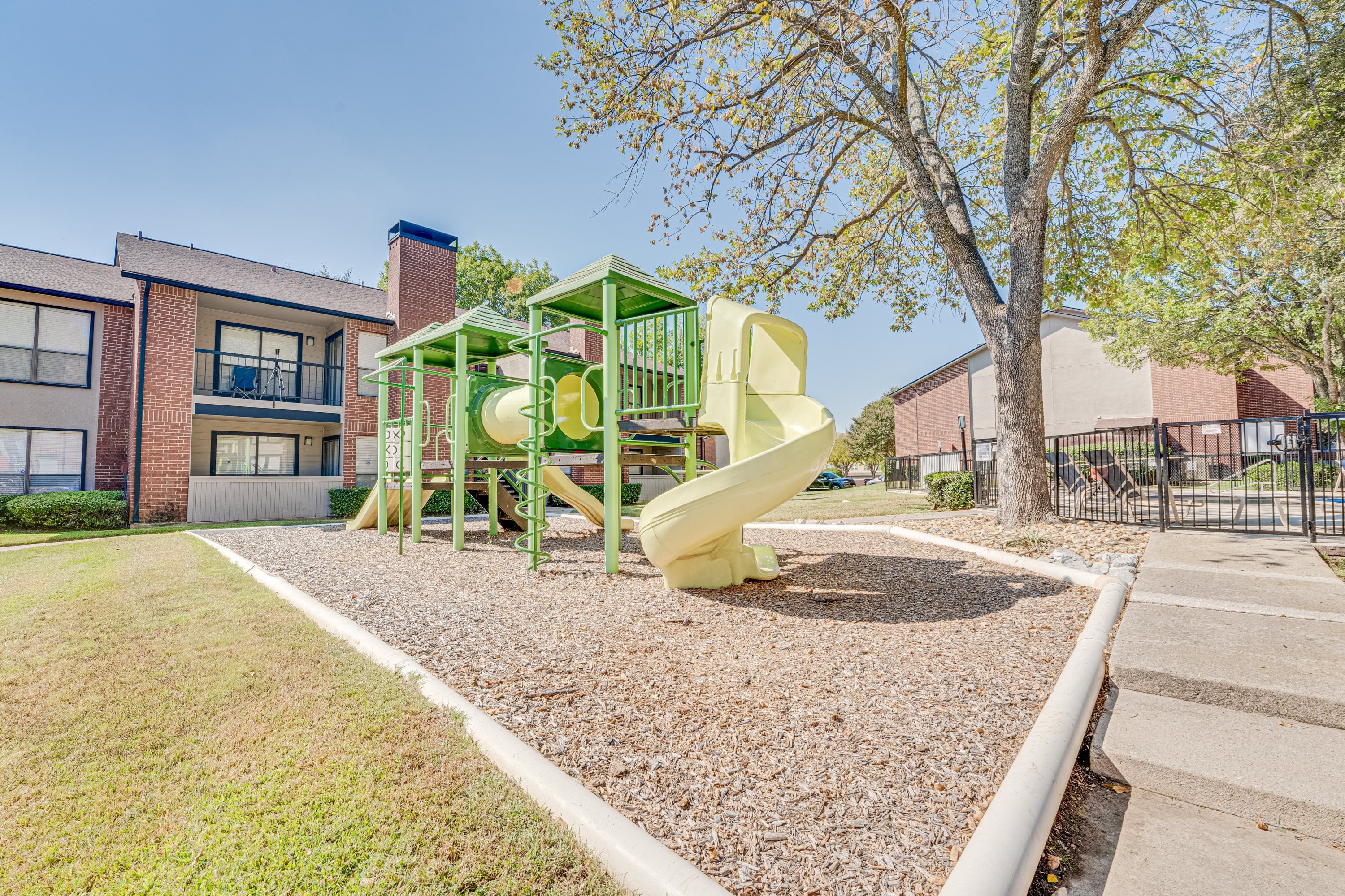 Community playground at Bardin Oaks Apartments, Texas, 76018